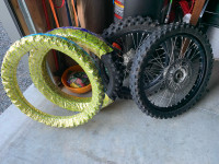 Dirt bike rims with brand new tires 