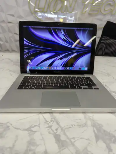 This Apple MacBook Pro combines power and portability, featuring a sleek design and robust performan...