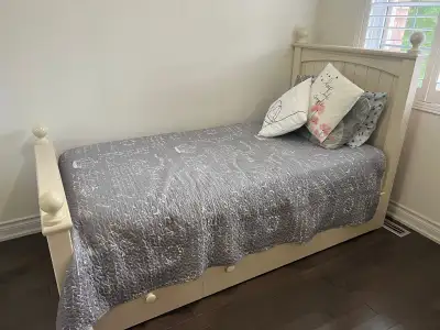 Used - Like new I have a single bed set with mattress. The bed has a slide out trundle bed and come...