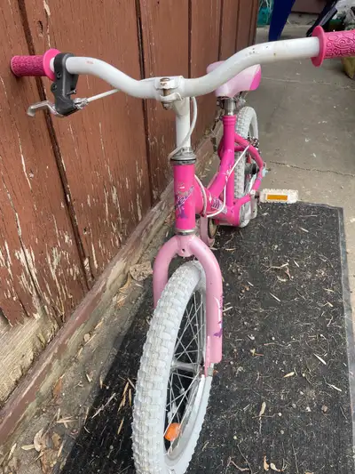 This is a pink Miele 16-inch kids bike $75 OBO also comes with training wheels * Brand: Miele * Whee...