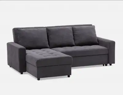 Sofa bed Megan model from Structube (discontinued). When the back rest is lowered, it becomes a King...