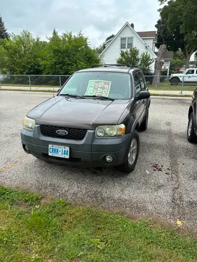 V6 front wheel drive 212000km AC good, transmission is iffy, Rust underneath interior good paint goo...