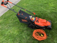 Black and Decker electric lawnmower with 100’ extension cord 