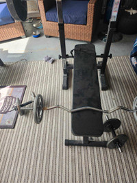 Bench press and bars and weights