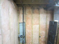 Renovation Materials:  Paneling & Fiberglass Pink Insulation