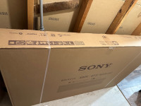 brand new - sealed Sony Bravia 65” smart Television.