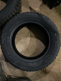 2 new studded 215/65/17 tires