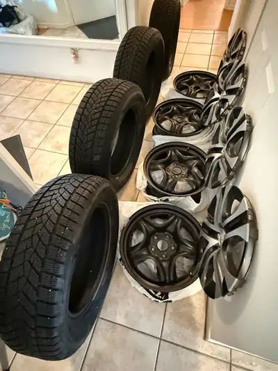 four High Quality Goodyear Winter ultragrip Winter tires almost new 9-10/32 , four Toyota original n...