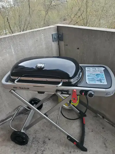 WEBER TRAVELER FOLDABLE GAS BBQ - Rarely used, View more