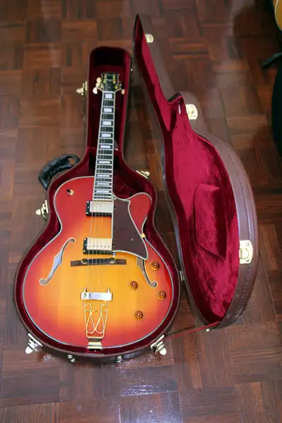 This guitar is a jazz style box similar in tone to the Epiphone Casino and made in Korea by the Peer...