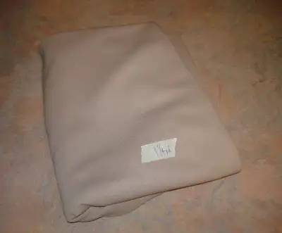 1.25 yards of beige colored polyester knit fabric From a smoke free, pet free, and bug free home! Se...