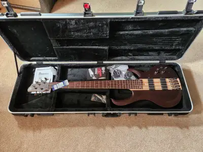 Selling my Ibanez BTB605TGF sample with Ibanez MRB350C moulded case sample. Sold As Is. No Ibanez wa...