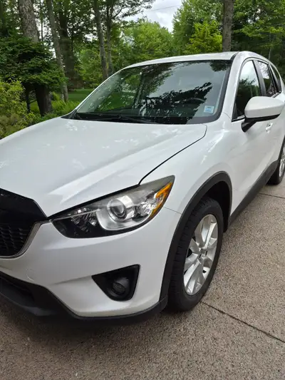 This 2014 Mazda CX-5 has less than 90,000 original kilometers—exceptionally low for the year—and has...