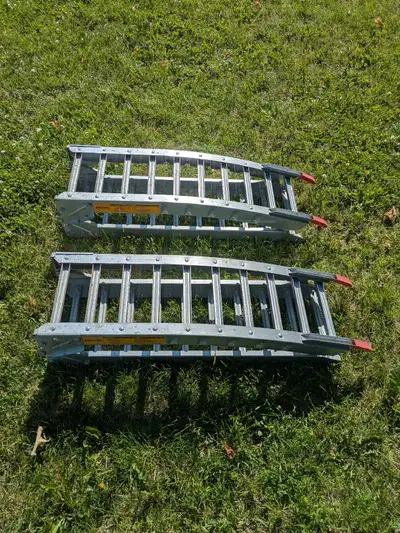 Pair of 7 foot folding ATV ramps. These ramps boast a sturdy all-steel construction for reliability...