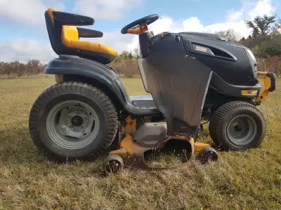Craftsman 26 HP Garden tractor, Blower , Trimmer, View more