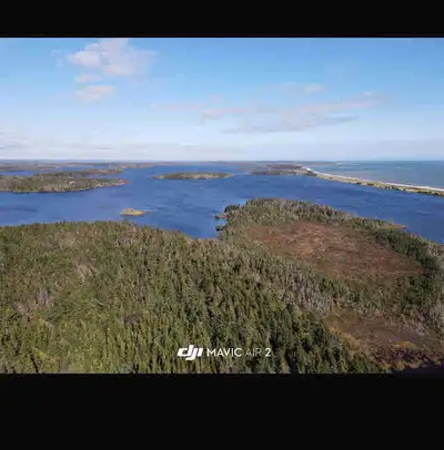 20+ acres just up from belfry beach off belfry rd. 3300+ ft of water from front on fresh lake that f...