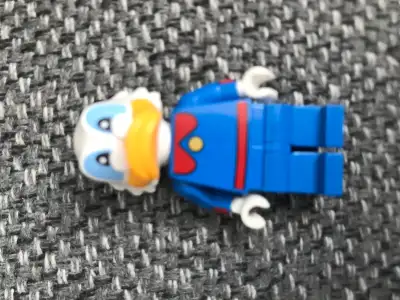 Disney Lego minifigure from the individual mystery packages. $2 or trade for a Lego City police char...