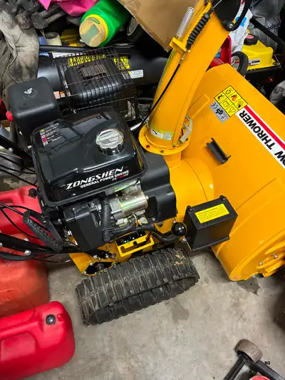 Snowblower Snow Thrower model. 11 HP. 28”. Caterpillar track. Heated grips. Works well. Pretty much...