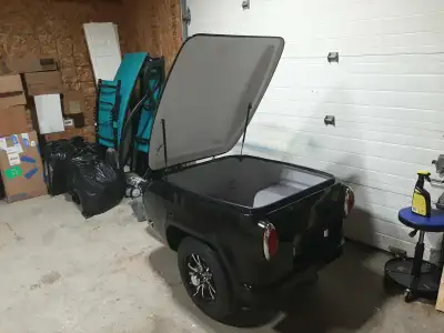 2025 touring trailer, new, great for your golf clubs, camping gear or groceries, pulls easily behind...
