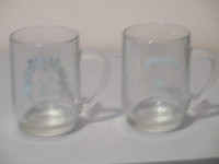 SET OF GLASS BEER STEINS. $10 FOR SET.