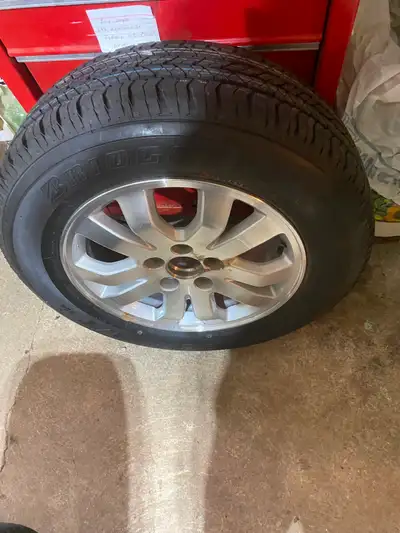 1-P 215-65-16 Bridge Stone AS Never put on rim or tire with Aluminum Rim off Older Honda CRV its 114...
