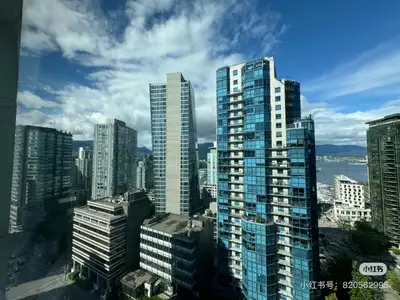 Welcome to the George in Coal Harbour. This 2 bedroom 2 bathroom with a den is located in Vancouver...