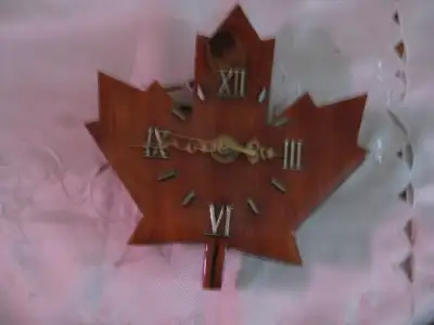 Vintage, wooden maple leaf wall clock, View more
