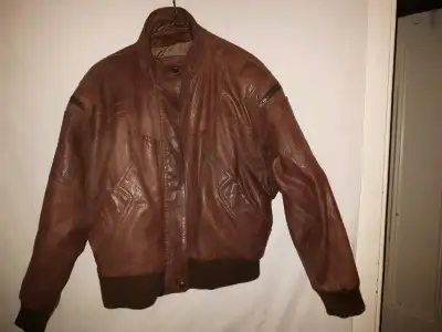 Brown Leather Jacket . Lightly used .