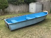 14 foot aluminum boat & ores & motor 