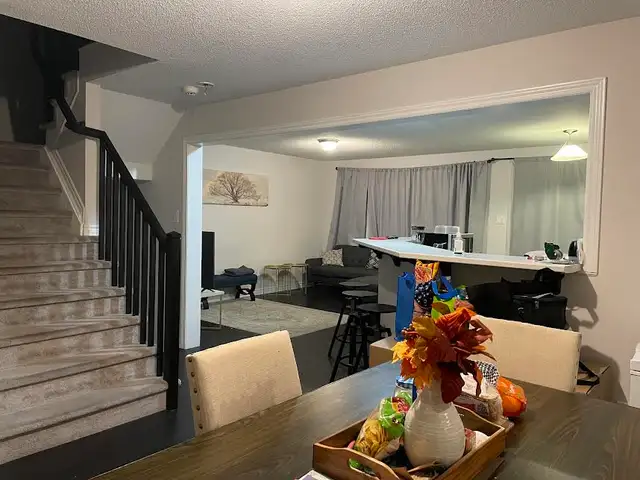 PRICE DROP 2 rooms in a 3 bedroom townhome for females only