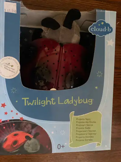 This is a Cloud b Twilight Ladybug that projects stars and makes a great night light for a baby's ro...