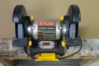 Ryobi 6" bench grinder. Like new. Wheels in new condition. 2.1A, 120VAC $60. Can deliver within reas...