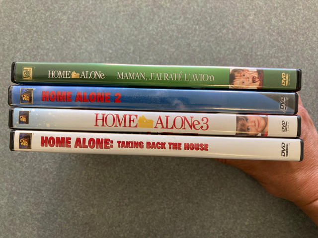 Home Alone 1 2 3 4 Christmas DVDs EUC Lost in New York Taking  in CDs, DVDs & Blu-ray in La Ronge - Image 3
