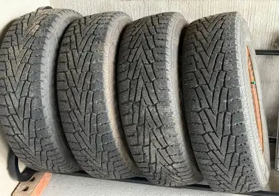 Complete set of 4 Nexen Winguard WinSpike SUV winter tires (235/65R17), mounted on rims, and sold wi...