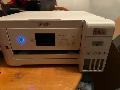 Epson eco tank et2850 printer scanner. Wifi enabled. Includes original box. Uses refillable tanks fo...