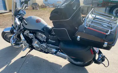This V-Rod is tastefully done with every accessory possible and is paired with a like-new Lugg 'n Ro...