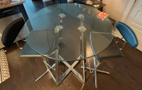 Glass and chrome Table and chairs