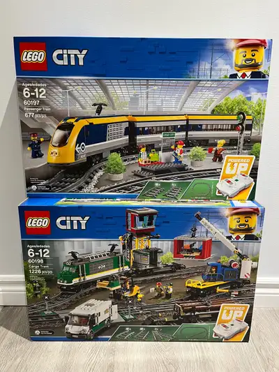 Brand new sealed sets. Take both for $590.