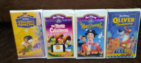 4 sealed Disney VHS Movies plus 46 near mint used ones