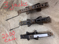 Three scissor jacks