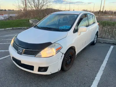 Parting out a clean, running 2009 Nissan Versa S Sedan (White). THE DIFFERENCE: This isn't a junk ya...