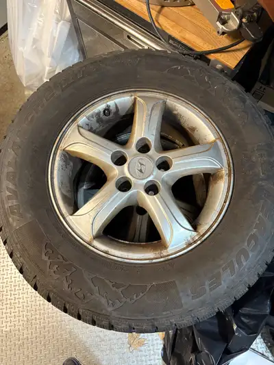 Four 235/70/r16 Snow tires on OEM Hyundai rims off of an older Sante Fe. Two are in good shape and t...