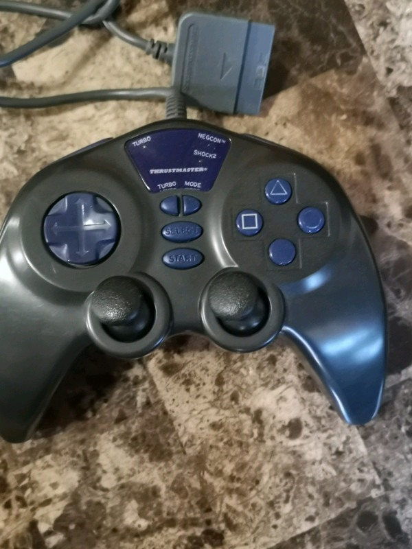 THRUSTMASTER WIRED PLAYSTATION CONTROLLER in Older Generation in Saskatoon