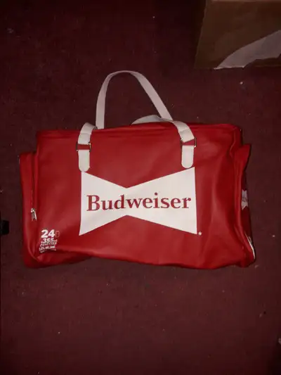 Pic 1 - have 3 of them - sort of leather type material, holds 24 cans, has handles plus two separate...