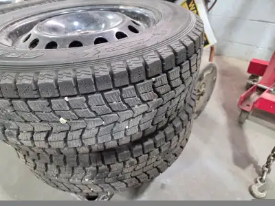 Set of 4 Dunlop directional winter tires (off the rims) 205/70R16 in very good condition About 80% t...