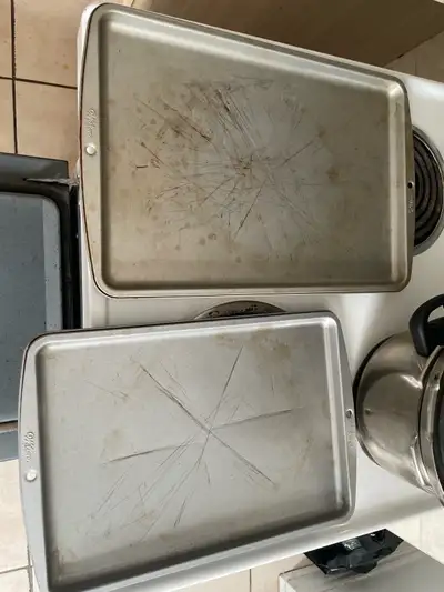 2 Wilton Baking Sheet Set: Heavily Used, View more