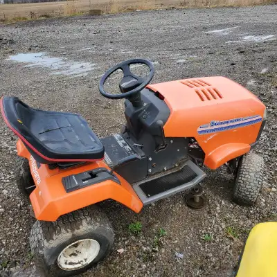 Riding Lawn Mowers, Murray Series, 42 inch cut, $600.00, runs and cuts well., There are a couple mor...