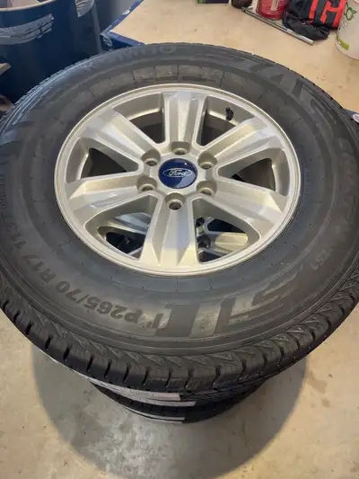 New 265/70/17 Kumho Crugen HT-51. Stock F150 Rims and Sensors, also comes with Kumho 105000km warran...