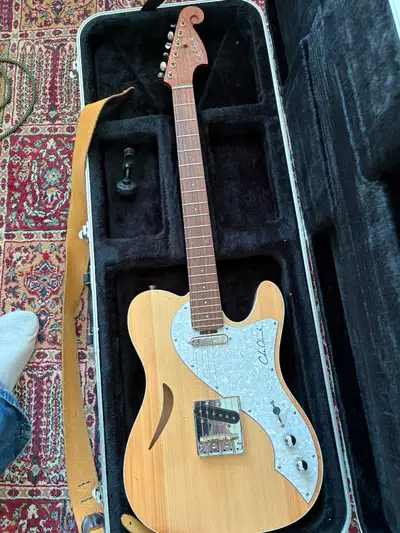 This is an extraordinary tele made in Australia. Plays very well, and I love it very much. Selling o...