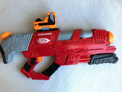 Power Raider Water Blaster! Air pressure water blaster has 3 adjustable nozzles and a red dot scope...